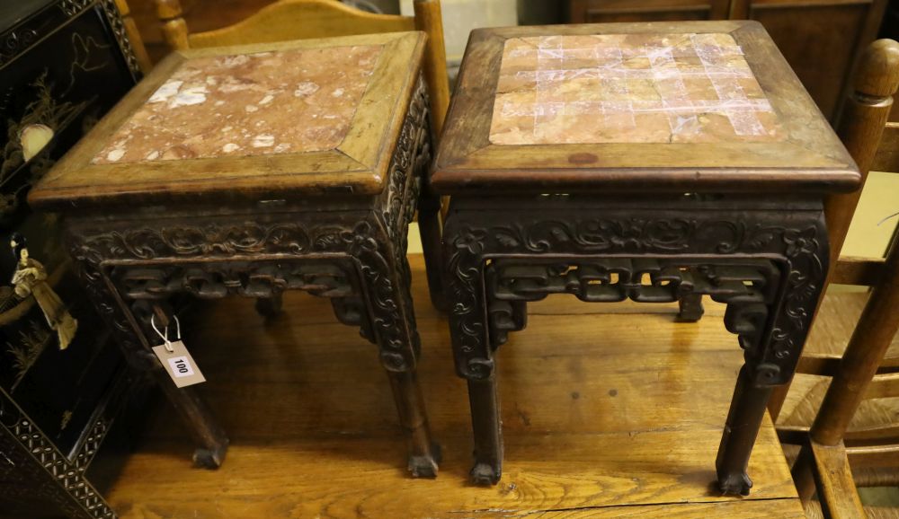 A pair of Chinese rectangular carved and pierced hardwood jardiniere stands with rouge marble tops, width 35cm, height 47cm